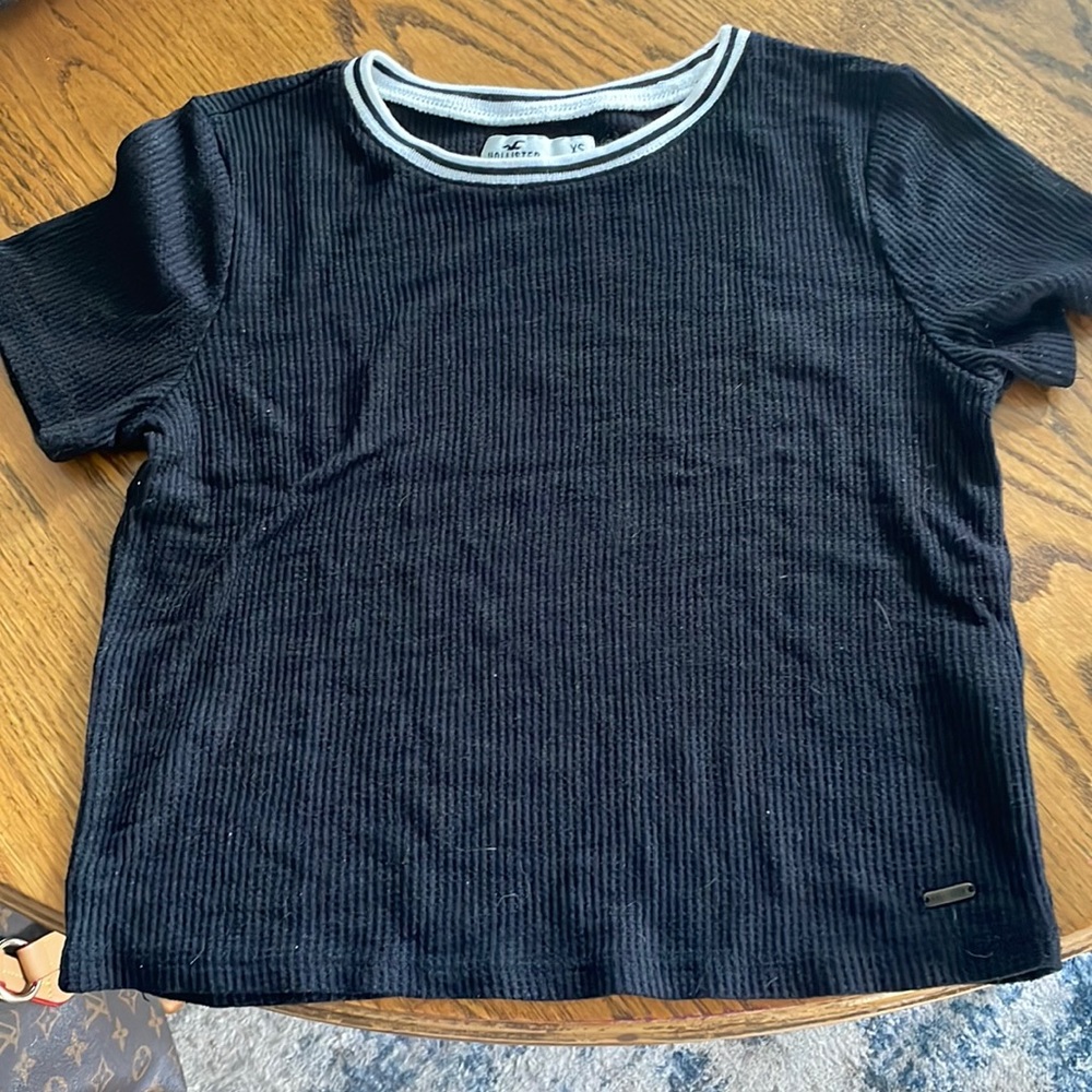 Hollister black with white and black collar size extra small gently worn